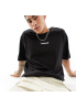Timberland – Czarny T-shirt oversize z logo z przodu